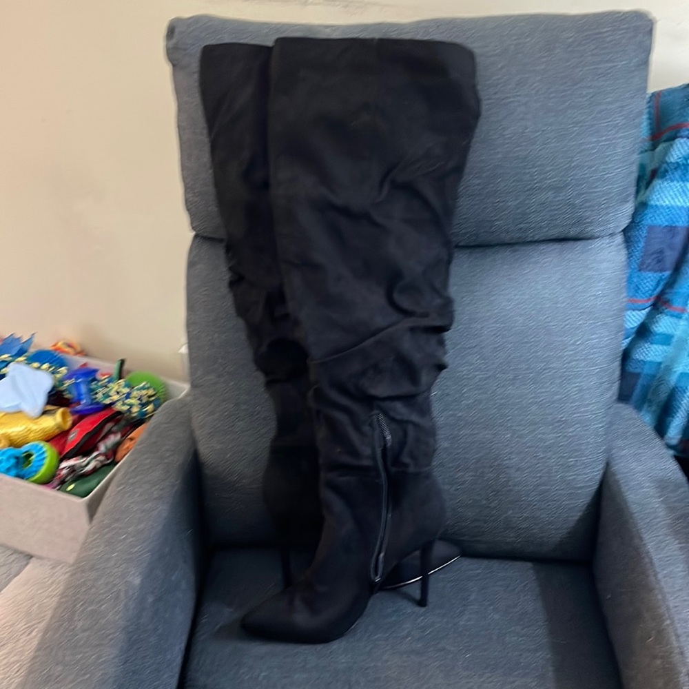 Tall black boots